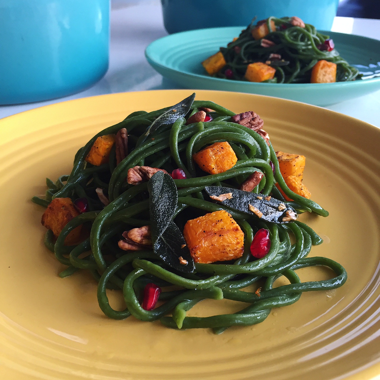 Spinach Pasta with Roasted Pumpkin, Pomegranate and Pecans in Sage Garlic Oil