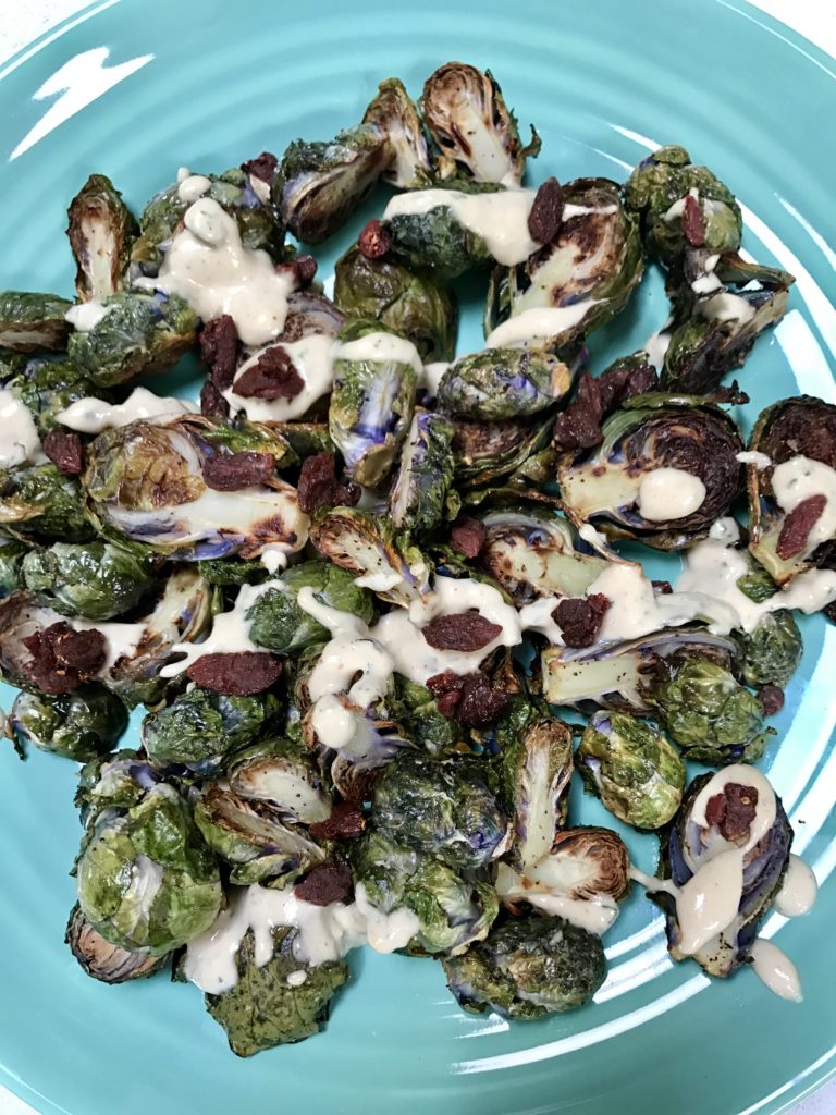 Roasted Kalettes with Lemon Tahini Dressing and Goji Berries